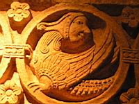 Cluny, Sculpture romane, Medaillon, Oiseau a tete d'homme (Musee du Palais Jean de Bourbon)